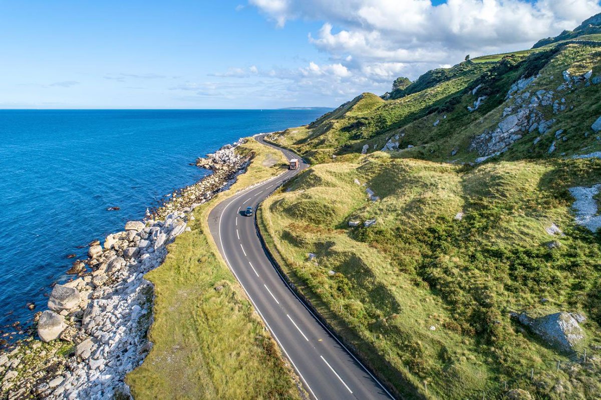Scenic Causeway Coastal Route along Northern Ireland's rugged Atlantic coastline